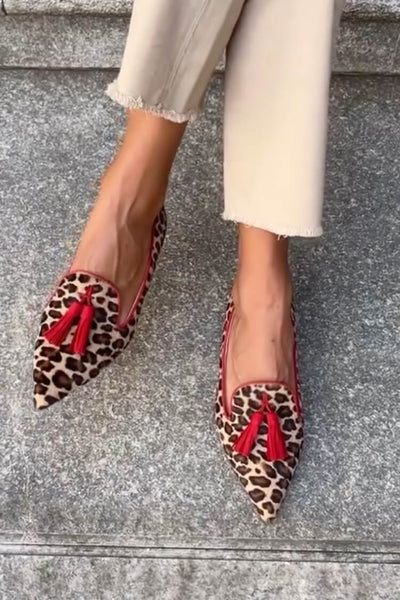 SAVINA | Elegant pointed-toe loafers with fringe details for a refined look